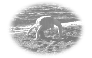 yoga wheel on the beach